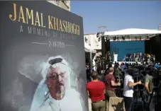  ?? Lefteris Pitarakis/ Associated Press ?? A picture of slain Saudi journalist Jamal Kashoggi is seen during a ceremony on Oct. 2, 2019, near the Saudi Arabia consulate in Istanbul where he was killed a year prior.