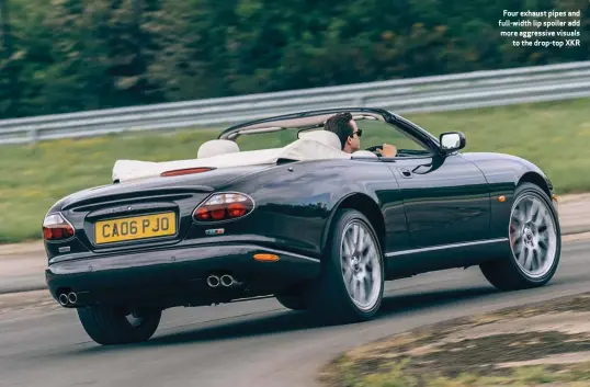  ??  ?? Four exhaust pipes and full-width lip spoiler add more aggressive visuals to the drop-top XKR