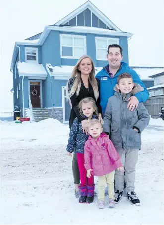  ?? PHOTOS: DON MOLYNEAUX ?? Rachel and Brent Stevens, with their children Maddax, 8, Savanna, 5, and Vivian, 2, were keen on living at Mahogany when they moved to Calgary, so they built their house from scratch.