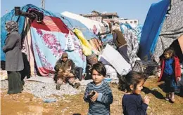  ?? EMIN OZMEN NYT ?? Displaced earthquake survivors are seen at a tent camp in Antakya, Turkey, on Thursday. The Turkish government is scrambling to house earthquake survivors.