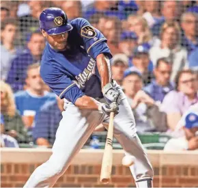  ?? EUROPEAN PRESS AGENCY ?? Lorenzo Cain suffered his intercosta­l strain last weekend and had adjustted his swing to compensate.