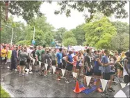  ?? CFA Society Hartford ?? Over 750 runners from Connecticu­t corporatio­ns braved the elements at the 2018 CFA Society Hartford Corporate 5K on August 3 in Hartford to raise over $15,000 for local nonprofit The Connection.