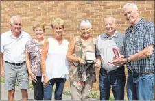  ?? SUEANN MUSICK/THE NEWS ?? Gordon MacDougall’s family recently donated his medals and other pieces of history associated with the time he served in the First Special Services to the Pictou County Military Museum. From left, Stephen MacDougall, Linda MacDougall, Toby MacDonald, Susan Hayman, museum curator David Avery and Allan MacDougall.