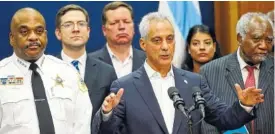  ?? THE ASSOCIATED PRESS ?? Chicago Mayor Rahm Emanuel, accompanie­d by Police Superinten­dent Eddie Johnson, left, and U.S. Rep. Danny Davis, right, announced last week a lawsuit against the Trump Justice Department over withholdin­g funding for sanctuary cities at City Hall in...