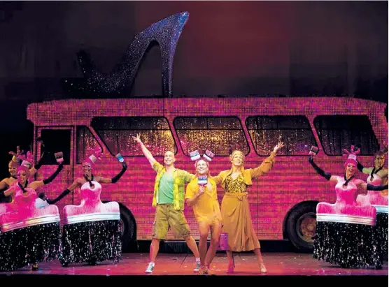  ??  ?? Wade McCollum (from left), Bryan West and Scott Willis sing “Colour My World” in the touring production of “Priscilla Queen of the Desert — The Musical,” which opens Tuesday at the Auditorium Theatre. The show travels with more than 500 costumes. |...
