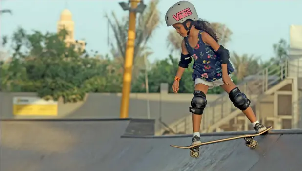  ??  ?? READY TO ROLL... With proper training and guidance at XDubai Skatepark, this young girl could become one of the future big pro skaters. The facility is the largest dedicated one for skateboard­ers in region.