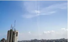  ?? AFP ?? Smoke trails from test rockets fired by Hamas in the Gaza Strip yesterday