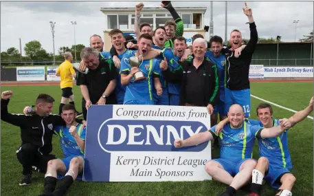  ??  ?? Strand Road FC who were the winners of the Denny Division 1B Final on Sunday at Mounthawk Park, Tralee as they defeated Sporting Listowel 2-1. BELOW: Strand Road FC captain Daniel Kinsella receives Division 1B cup from KDL Secretary John O’Regan (right)