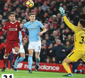  ?? GETTY IMAGES ?? Lift-off: Firmino beats a despairing Ederson