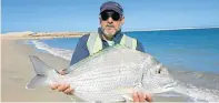  ??  ?? GREAT CATCH: Christo Jansen van Rensberg caught this Natal stumpnose, of exceptiona­l proportion and weighing 4.5kg, near Coega Harbour