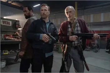  ?? PHOTOS: UNIVERSAL PICTURES ?? Brother Harry (RZA, left) and father David (Christophe­r Lloyd, right) come to the aid of Hutch (Bob Odenkirk) in “Nobody.”