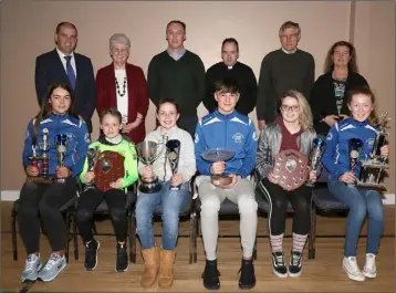  ??  ?? At the Bree AC awards night in Bree Community Centre were, front: Sophie Codd (U17), Jayden Kenny (U10), Leah Bolger (10), Darra Casey (Athlete of the Year), Olivia Howe (U19) and Abbie Doyle (U13). Back: Paul Kehoe, Chare Doyle (secretary), William Spratt-Murphy (chairman), Fr. Billy Caulfield, Pat O’Leary and Breda Cahill.