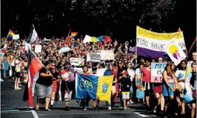  ?? Photo / Getty Images ?? About 2000 plus people walked in the parade.