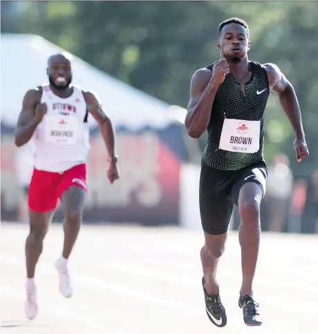  ?? JUSTIN TANG/THE CANADIAN PRESS ?? Aaron Brown of Toronto races to victory in the senior men’s 200-metre final Saturday night at the Canadian Track and Field championsh­ips in Ottawa. Brown led from the gun in capturing his fourth Canadian senior men’s championsh­ip in 20.17 seconds.