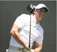  ?? Julio Cortez / Associated Press ?? Rory McIlroy reacts after playing his shot from the fourth tee in the first round of the U.S. Open.