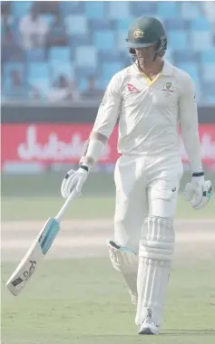  ??  ?? Australian cricketer Mitchell Starc leaves the field after being dismissed by Muhammad Abbas of Pakistan during the third day of play of the first Test cricket match in the series between Australia and Pakistan at the Dubai Internatio­nal Stadium in Dubai on Oct 9 file photo. — AFP photo