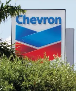  ??  ?? MIAMI: A Chevron sign in Miami. Chevron Corp reported financial earnings on Friday. —AP
