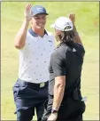  ?? STACY REVERE — GETTY IMAGES ?? Bryson DeChambeau, left, and Aaron Rodgers celebrate winning The Match against Tom Brady and Phil Mickelson.