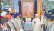  ??  ?? SGPC head Jagir Kaur and Akal Takht acting Jathedar Giani Harpreet Singh unveiling the portrait of Bhai Lachhman Singh Dharowali in Amritsar on Monday.
SAMEER SEHGAL/HT