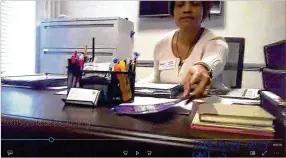  ?? SMYRNA POLICE DEPARTMENT ?? Provident Village at Creekside’s then-executive director, Elaine Austin, speaks with police a day after a Feb. 22, 2018, incident where a facility caregiver pushed resident Ronald West. Officers in the 3-minute, 42-second video never gather evidence or express skepticism. She left the facility in May 2018 and now works at another metro Atlanta senior care facility.