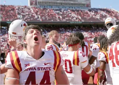  ?? (Photo by Ian Maule, Tulsa World, AP) ?? Iowa State linebacker Bobby McMillen III yells in celebratio­n after his team's win over the Oklahoma on Saturday.