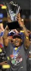  ?? MARK J. TERRILL, THE ASSOCIATED PRESS ?? Marcus Stroman celebrates after the USA’s 8-0 win over Puerto Rico on Wednesday.