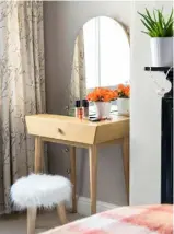  ??  ?? MAKE-UP TIME Karla’s compact, Scandi-inspired dressing table is small enough to fit neatly into the bedroom alcove and the furry stool is a fun touch. Both the faux-fur stool and dressing table are from La Redoute.