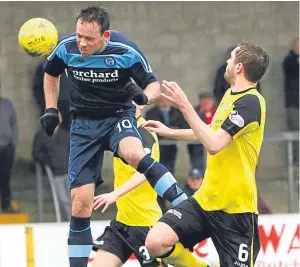  ?? Picture: Dougie Nicolson. ?? Jim Lister heads for goal to make it 1-0 to Forfar.