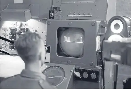  ??  ?? A radar operator maintains a watching brief on the English Channel for signs of an enemy invasion at the height of the Second World War.