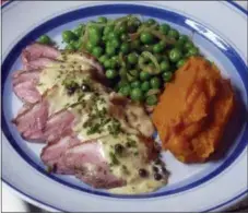  ?? SARA MOULTON VIA AP ?? This photo shows sauteed duck breasts in New York. This dish is from a recipe by Sara Moulton.