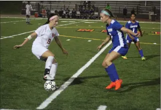  ?? STAFF PHOTO BY AJ MASON ?? North Point’s Aimee Latour, left, scored the lone goal in Tuesday’s 1-0 win over Leonardtow­n.