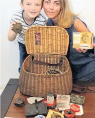  ??  ?? Taking the bait Daniel Hamilton and mum Angela examine the basket’s contents