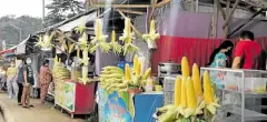  ?? —DIVINA M. SUSON ?? SLOW DOWN Business has slowed down for these popular snack stalls along Iligan City’s C3 road after the local government imposed limitation­s on the movement of people to curb the rise of COVID-19 cases.