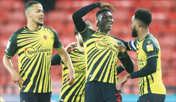  ?? PICTURE: Alamy ?? SARR THERE! Watford’s Ismaila Sarr, second right, celebrates scoring their first goal