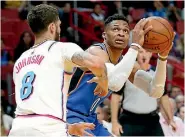  ?? AP ?? Oklahoma City Thunder guard Russell Westbrook got busy against the Miami Heat in their penultimat­e game of the regular season.
