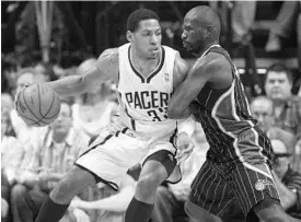  ?? GARYW. GREEN/STAFF FILE PHOTO ?? Danny Granger, left, defended by the Magic’s Jason Richardson during the 2012 playoffs, spent last season with the Clippers but was a productive player with the Pacers.