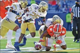  ??  ?? Tech had a chance to take an early lead after recovering a fumble by Clemson running back Travis Etienne in the first quarter, but the Tigers forced a three-and-out.