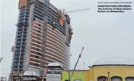  ?? STAFF PHOTO BY PATRICK WHITTEMORE ?? CONSTRUCTI­ON CONTINUES: The Exterior of Wynn Boston Harbor on Wednesday.