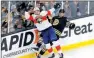  ?? PHOTO: AP ?? The Florida Panthers’ Sam Bennett, left, checks the Boston Bruins’ Parker Wotherspoo­n during Game 4 of their NHL second-round playoff series in Boston, Massachuse­tts, on Sunday.