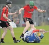  ??  ?? A sore buttocks but a league title - Jonathan O’Neill suffers the wrath of Fintain Conway.