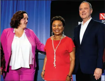  ?? RICHARD VOGEL / ASSOCIATED PRESS ?? U.S. Rep. Adam Schiff, right, is joined by fellow Reps. Katie Porter, left, and Barbara Lee on Oct. 8 in Los Angeles after a U.S. Senate Candidate Forum hosted by the National Union of Health Care Workers. The California Democrats are vying for the seat that opened when Dianne Feinstein died in Septemeber and is now held by Laphonza Butler.