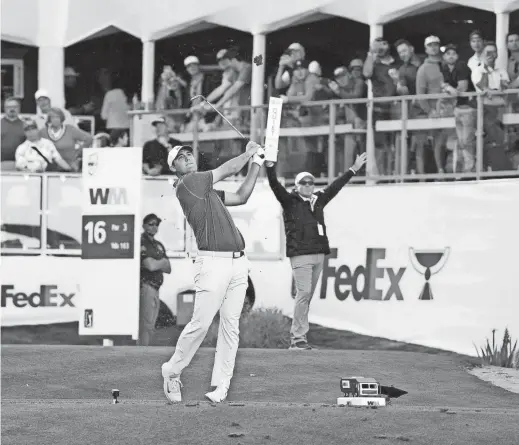  ?? PHOTOS BY ROB SCHUMACHER/THE REPUBLIC ?? Scottie Scheffler plays his tee shot on the 16th hole during Round 3 at TPC Scottsdale on Saturday.