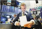  ??  ?? Trader Ronald Madarasz works on the floor of theNew York Stock Exchange on Feb 15. Stocks rose in Wall Street after Chinese and USofficial­s agreed to continue trade talks in Washington next week.(AP)