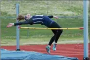  ?? DENNIS KRUMANOCKE­R - FOR DIGITAL FIRST MEDIA ?? Kutztown’s Skylar Miller clears the bar in the high jump during a meet last week,