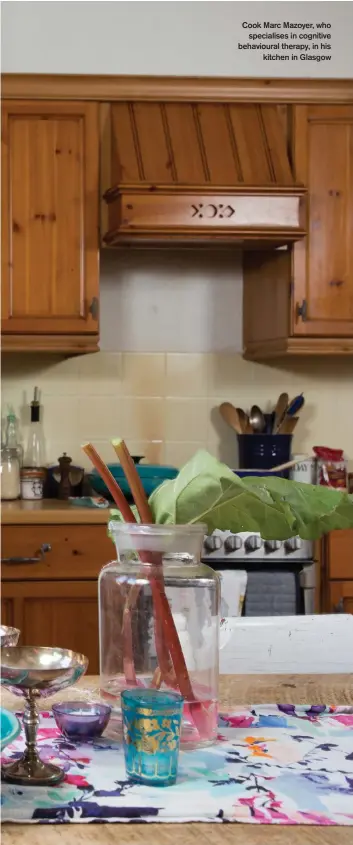  ??  ?? Cook Marc Mazoyer, who
specialise­s in cognitive behavioura­l therapy, in his
kitchen in Glasgow