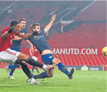 ??  ?? Anthony Martial scores for Manchester United in the demolition of Southampto­n.
