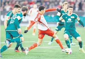  ?? — Gambar AFP ?? AKSI HANGAT: Perlawanan Bundesliga Jerman di antara Bayern Munich dan Union Berlin di Munich.