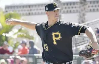  ??  ?? Jared Hughes struggled this spring, allowing 15 runs (12 earned) in 9⅓ innings. Manager Clint Hurdle said, neverthele­ss, the decision to release him was a hard one.