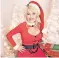  ?? ?? THE picture Dolly Parton posted on Twitter with the message: ‘Me, when someone tells me it’s too early for Christmas music.’