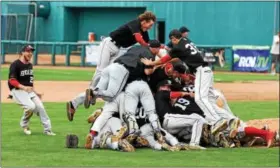  ?? AUSTIN HERTZOG - DIGITAL FIRST MEDIA ?? The Boyertown baseball team piles on to one another after winning the PIAA Class AAAA championsh­ip game over Plum, 4-1.